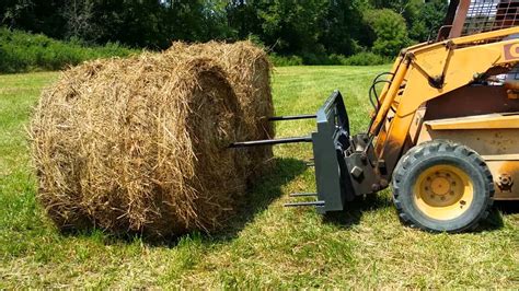 skid steer hay cutter|tractor hay hauling equipment.